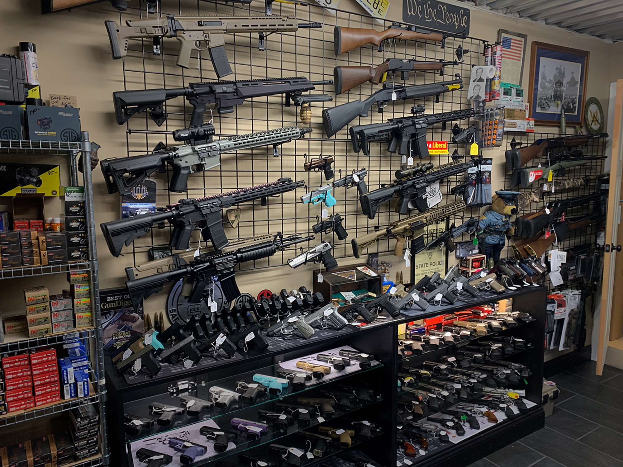 Whittaker Arms Gun Shop wall of Firearms